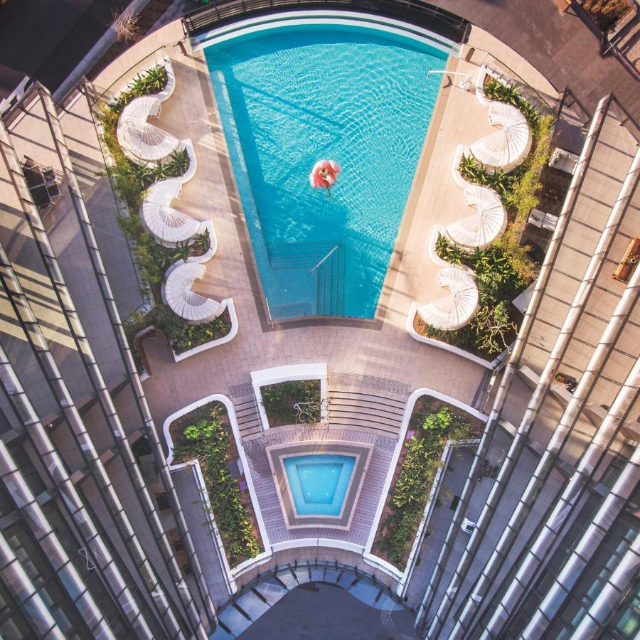 One Global Resorts Green Square Sydney Exteriör bild The pool at the 1018